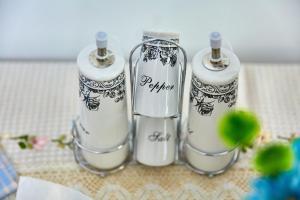 a group of three perfume bottles sitting on a table at Elite Mamaia Nord in Năvodari