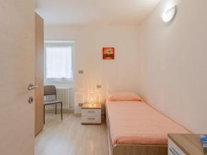 Postel nebo postele na pokoji v ubytování Apartment Nonni by Interhome