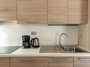 Kuchyň nebo kuchyňský kout v ubytování Apartment Nonni by Interhome