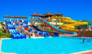 a large water park with a water slide at Xanadu Makadi Bay - High Class All Inclusive in Hurghada