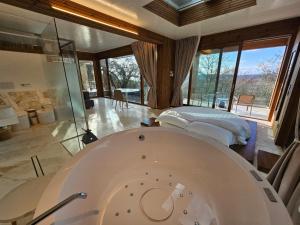 A bed or beds in a room at EcoResort Il Cantico della Natura