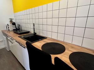 Kuchyň nebo kuchyňský kout v ubytování ALTiDude Ultra Central - Private Parking + 18 fotografií