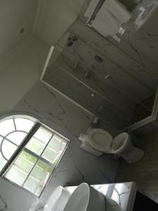 Vonios kambarys apgyvendinimo įstaigoje Lotus Guest House