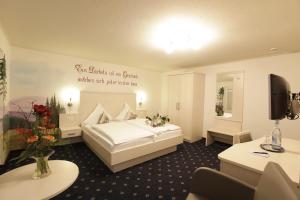 Llit o llits en una habitació de Haus Waldesruh