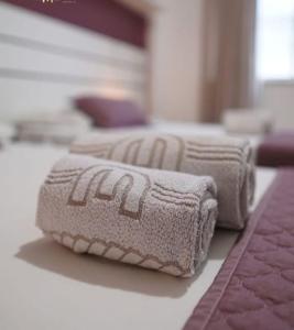 Postel nebo postele na pokoji v ubytování Hotel Marlen
