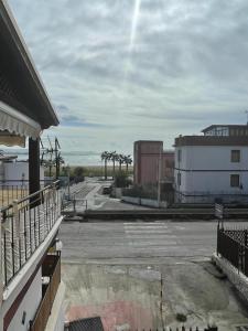an empty parking lot with trees in the distance at APPARTAMENTO MARE E SPIAGGIA in Porto Empedocle