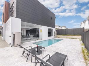 Kolam renang di atau dekat dengan Prestige and Elegance 5BR House w Pool Rochedale