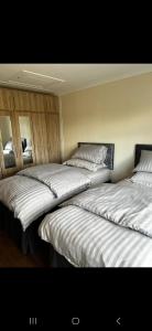 Een bed of bedden in een kamer bij Badgers rest lodge