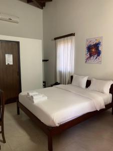 Postelja oz. postelje v sobi nastanitve Hotel Il Castello