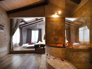 A bed or beds in a room at EcoResort Il Cantico della Natura