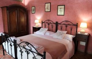 Postel nebo postele na pokoji v ubytování B&B Villa Giusy