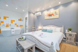 Postel nebo postele na pokoji v ubytování Apart-rent Villa Fluvia 0002