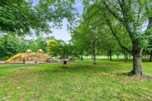 a park with a playground with a slide at Crystal City Boutique Flats Free Parking 201 in Arlington