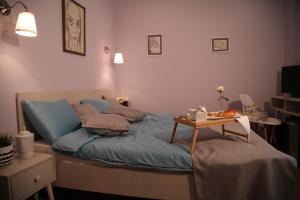 Säng eller sängar i ett rum på Bed&Breakfast kod Smilje