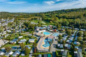 an aerial view of a resort with a pool at Camping La Vallée - Roan in Houlgate