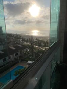 Πισίνα στο ή κοντά στο AP 406 PAINEIRAS PRAIA GRANDE