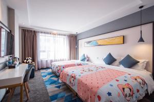 Postel nebo postele na pokoji v ubytování Chong Li Hotel Chengdu