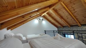 Voodi või voodid majutusasutuse Gogo Moustache Guest House toas