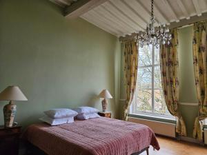 Postel nebo postele na pokoji v ubytování B&B Monumentaal Logeren