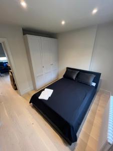 En eller flere senger på et rom på Stunning Portobello Road flat