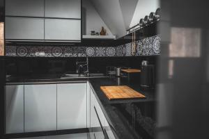 Kuchyňa alebo kuchynka v ubytovaní KANIA Apartamenty - Zakopane