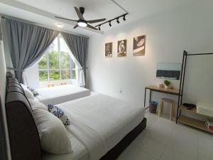 Ένα ή περισσότερα κρεβάτια σε δωμάτιο στο Dream 5 @ Emerald avenue