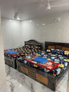 Katil atau katil-katil dalam bilik di S.V. Residency