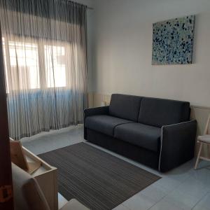 Posezení v ubytování Etna little Home