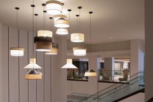 a room with many lights hanging from the ceiling at Sheraton Fort Worth Downtown Hotel in Fort Worth