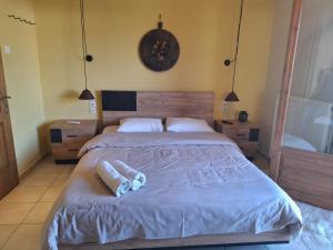 Postel nebo postele na pokoji v ubytování Skourgias Rooms