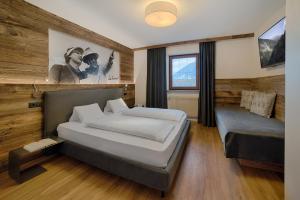 Postel nebo postele na pokoji v ubytování Residence Alpenrose