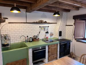 Η κουζίνα ή μικρή κουζίνα στο Apartamentos El Naranjo