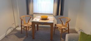 Posezení v ubytování Ferienhaus Pauls Ferienhaus Pauls, Whg 06 + 2 fotografie