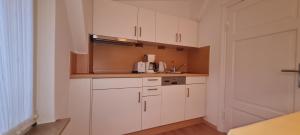 Kuchyň nebo kuchyňský kout v ubytování Ferienhaus Pauls Ferienhaus Pauls, Whg 08