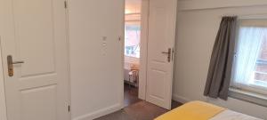 Postel nebo postele na pokoji v ubytování Ferienhaus Pauls Ferienhaus Pauls, Whg 08