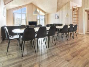 a conference room with a table and chairs at Holiday Home Eilen - all inclusive - 3-3km from the sea by Interhome in Rømø Kirkeby