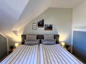 Postel nebo postele na pokoji v ubytování Apartment Haus an der Sonne by Interhome