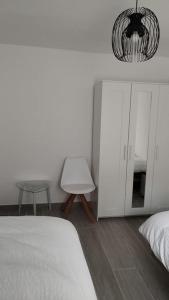 Un ou plusieurs lits dans un hébergement de l'établissement Apartamento moderno a 1km de Granada