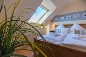 Postel nebo postele na pokoji v ubytování Ferienwohnung Ihr Zuhause am Meer
