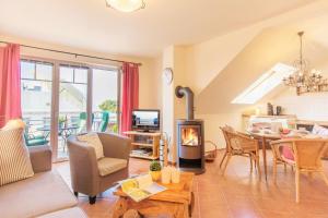 Posezení v ubytování Ferienwohnung Ihr Zuhause am Meer