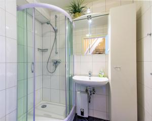 Koupelna v ubytování Ferienwohnung Ihr Zuhause am Meer