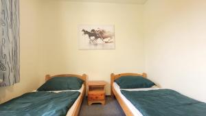 Postel nebo postele na pokoji v ubytování Pension Patanka