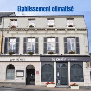 a building with a sign on top of it at Logis Loire Hotel - Les Cocottes Restaurant in Les Rosiers-sur-Loire