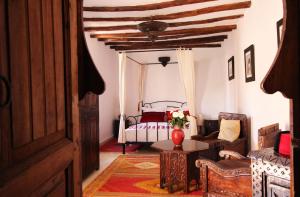 Katil atau katil-katil dalam bilik di Riad Palmier