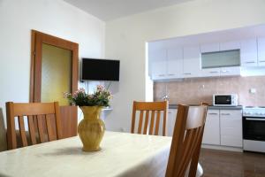 Kuchyňa alebo kuchynka v ubytovaní Apartman Pogled