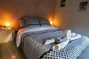 Postel nebo postele na pokoji v ubytování L'Hôtel Enfoncé, chambres d'hôtes