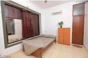 Voodi või voodid majutusasutuse Mount De Kumarakom - Heritage Homestay toas