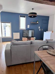 Kuchyňa alebo kuchynka v ubytovaní Le Rabelais, superbe appartement en duplex, proche forteresse et monument historique