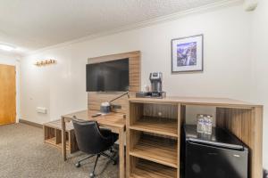 Μια τηλεόραση ή/και κέντρο ψυχαγωγίας στο Alpenhof Lodge