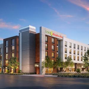 a rendering of a hotel with a building at Home2 Suites By Hilton Austin East Side in Austin